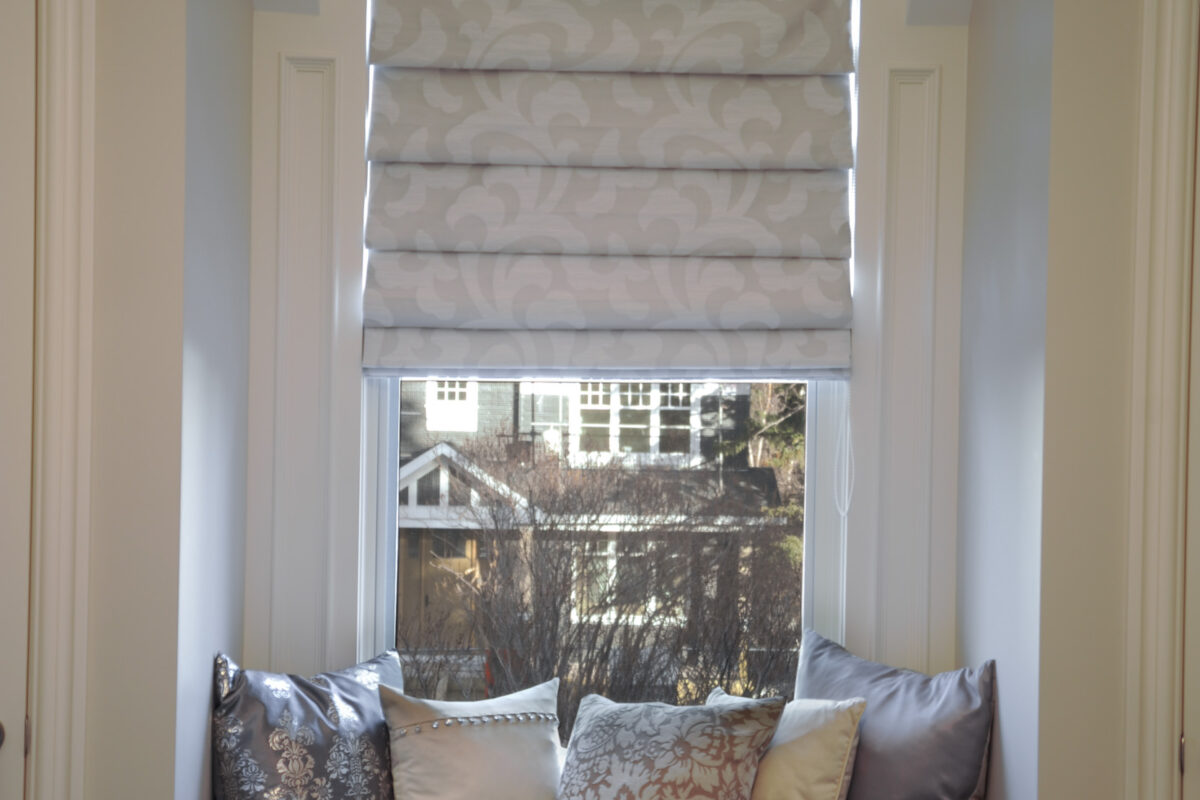 Fabric cascade style roman shades